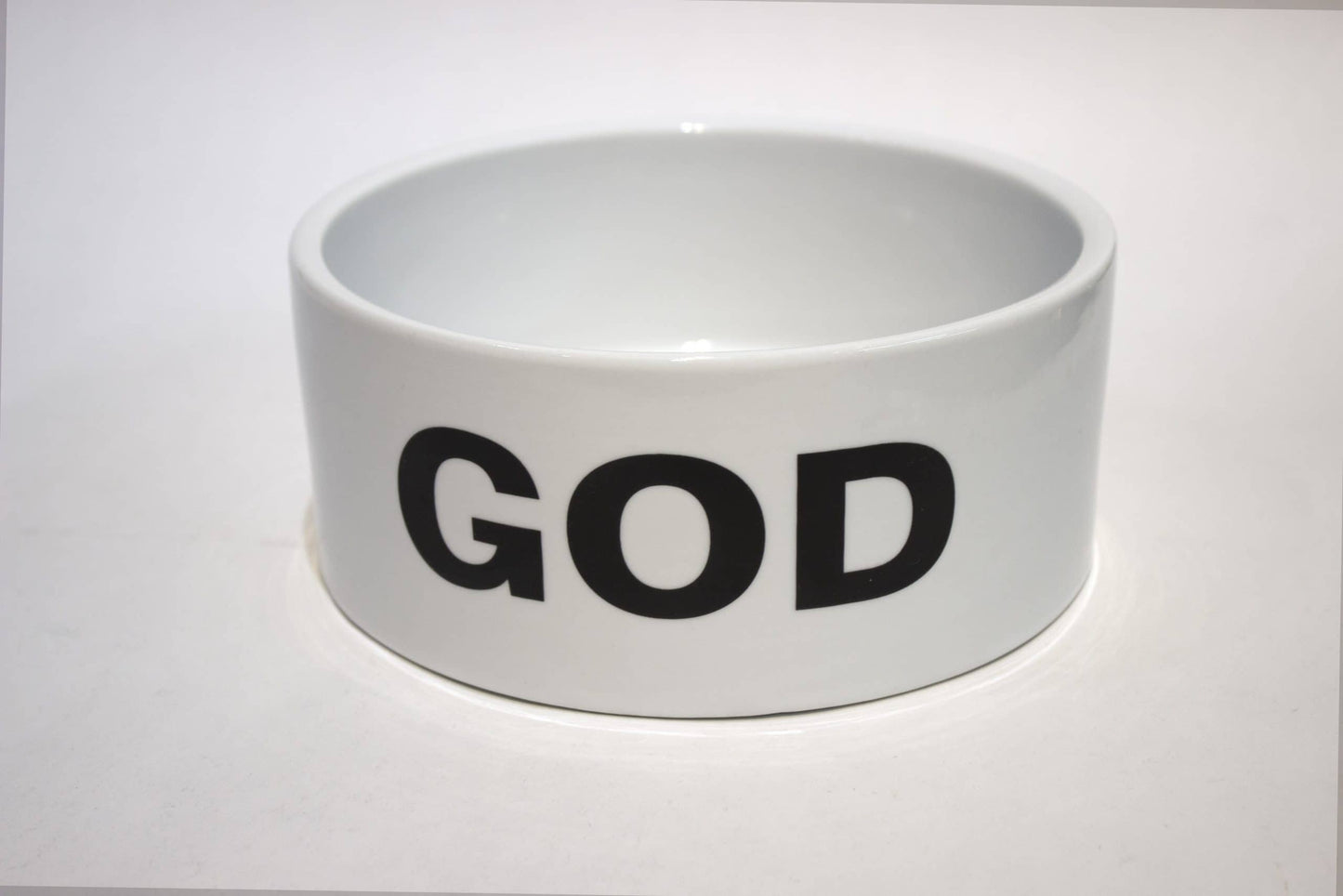 Close up of Ligorano Reese's ceramic Holy Chow dog bowl. Signed edition of 500 with gift box. From Artware Editions and Pure Products USA.