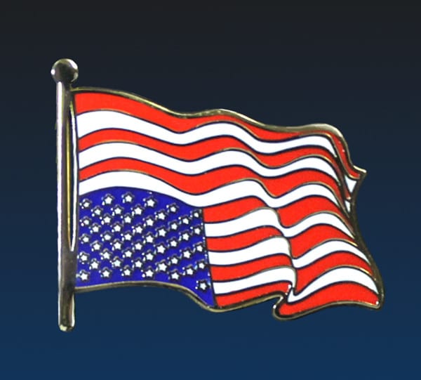 Close up of Ligorano Reese's Dress For Distress upside down American flag pin. Gold enamel. Butterfly clutch. From Pure Products USA.